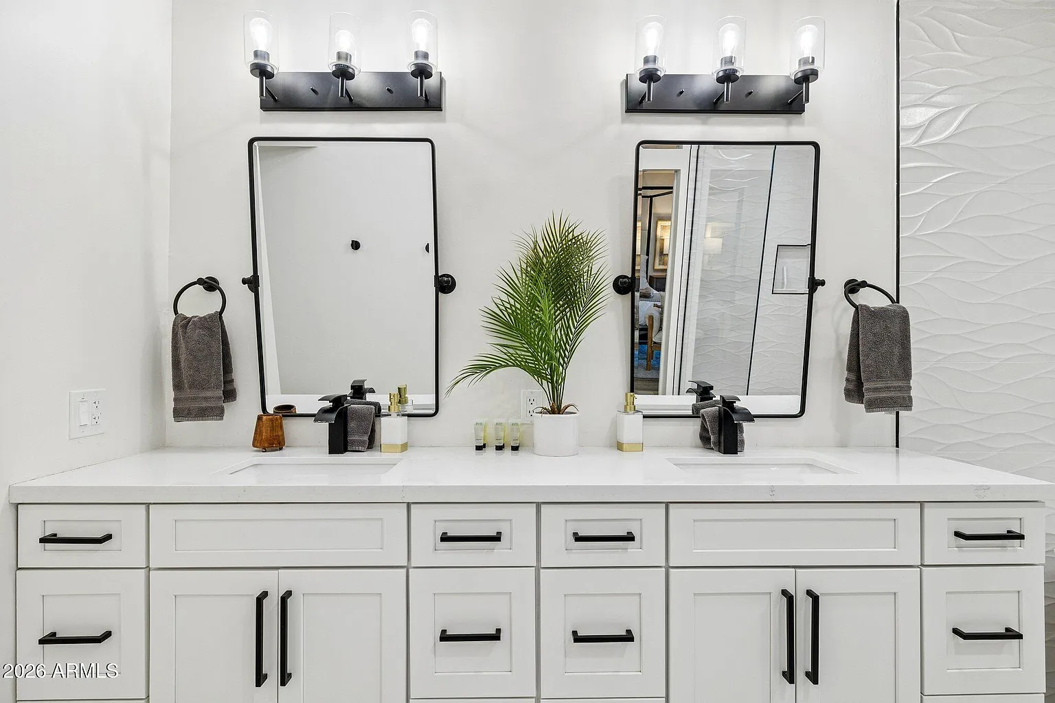 Guest bath with double vanity and matte black fixtures