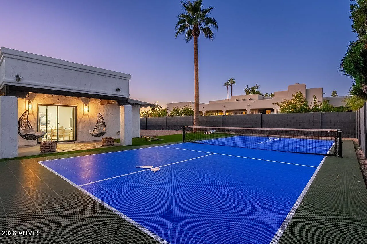 Private pickleball court and casita at dusk
